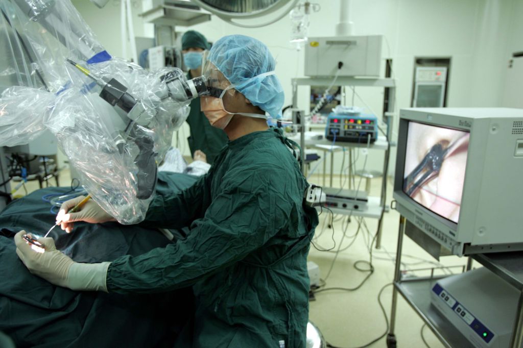 Poor patients receiving subsidised ear surgery during the China Mission.